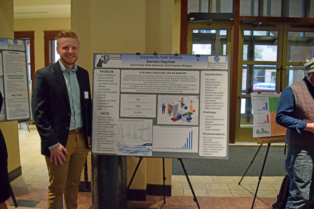 Darrien Hayman with his reseach poster